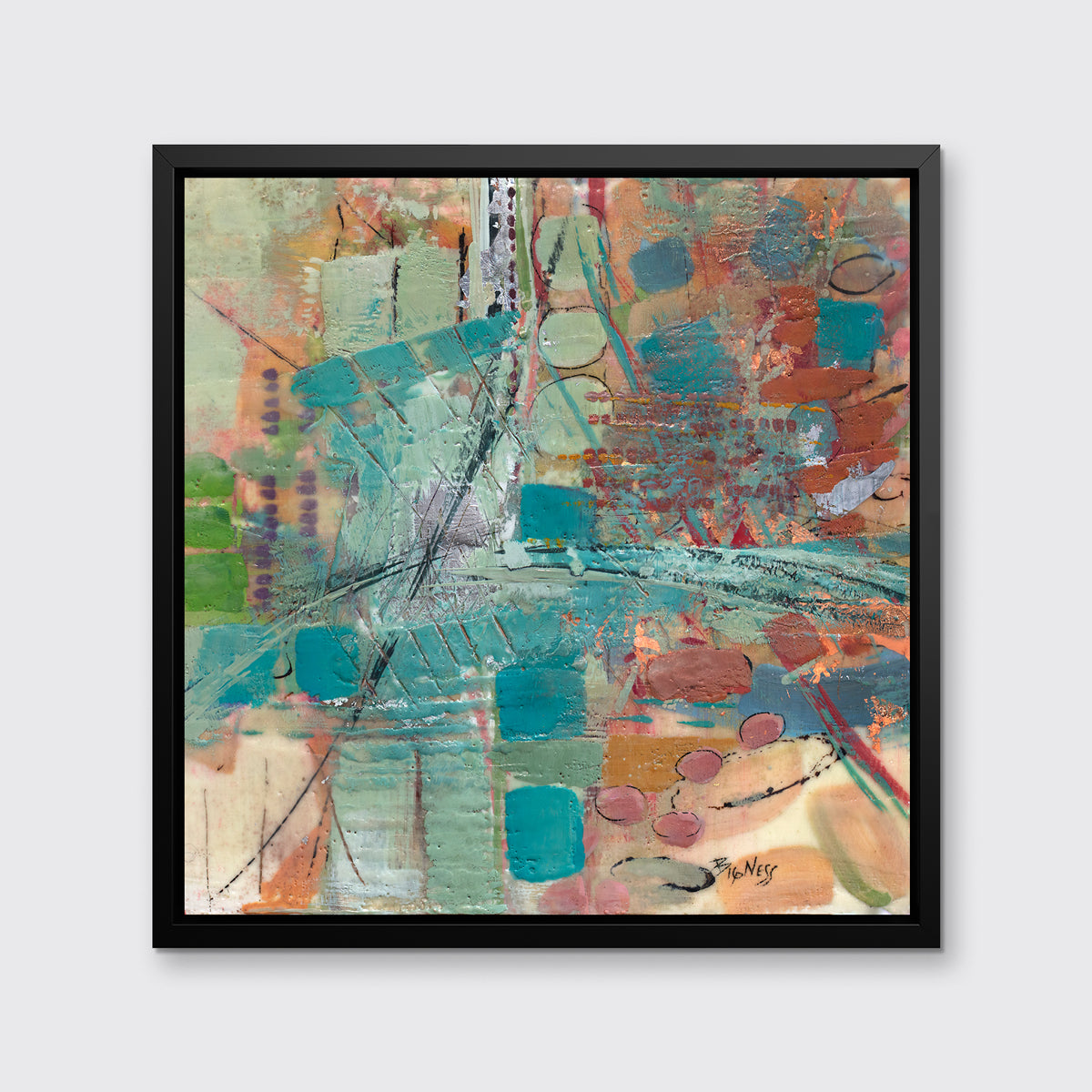 A multicolored abstract print framed in a black floater frame hangs on a light grey wall.