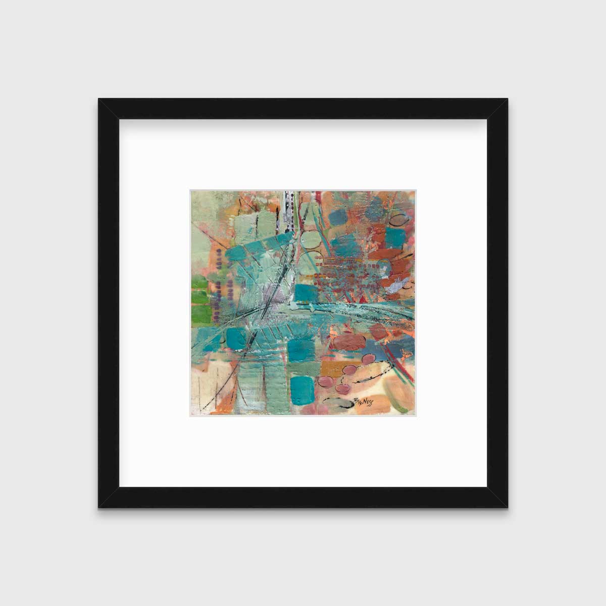 An abstract multicolored print, matted and framed in a black frame hanging on a light grey wall.
