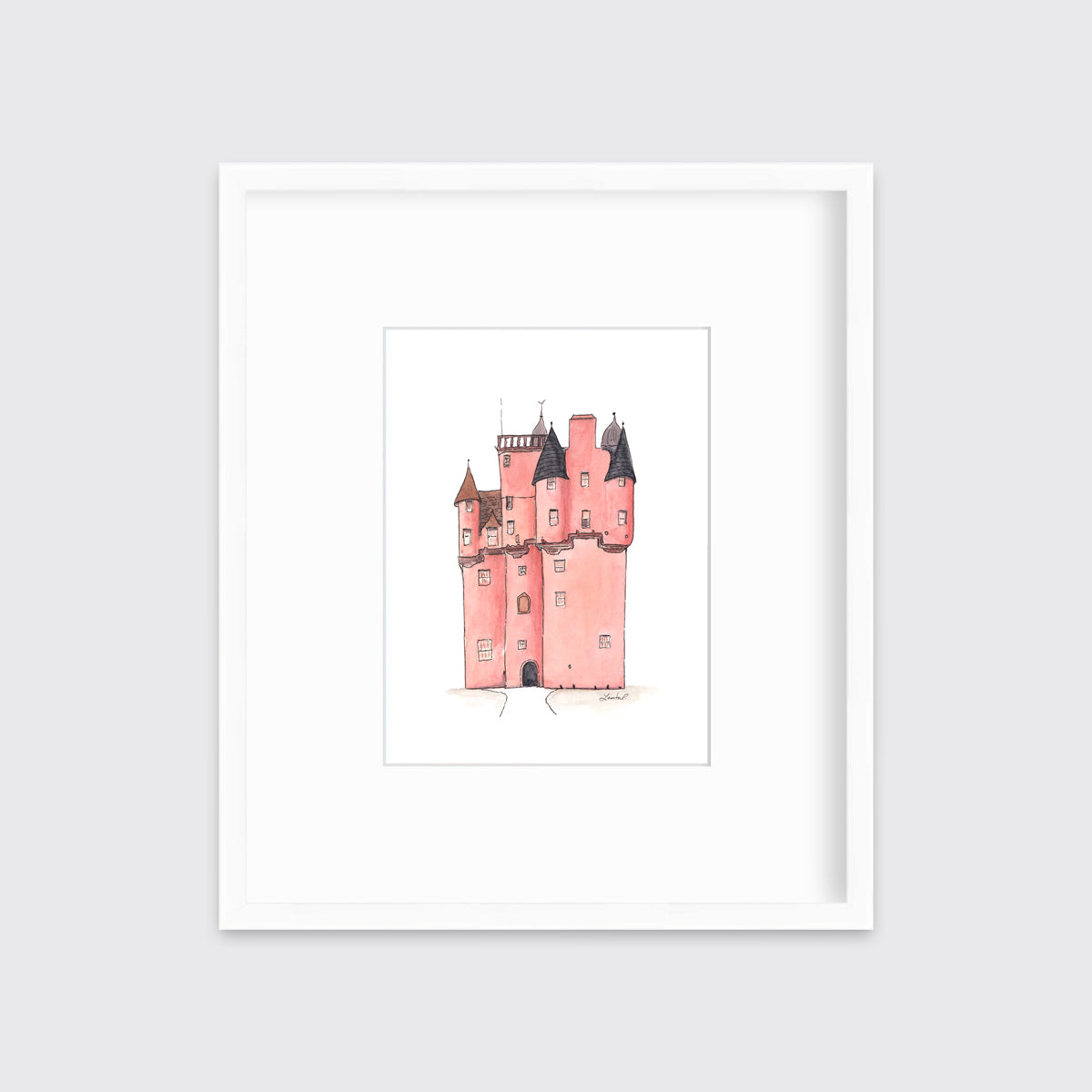 A pink and grey castle print in a white frame with a mat hangs on a white wall.
