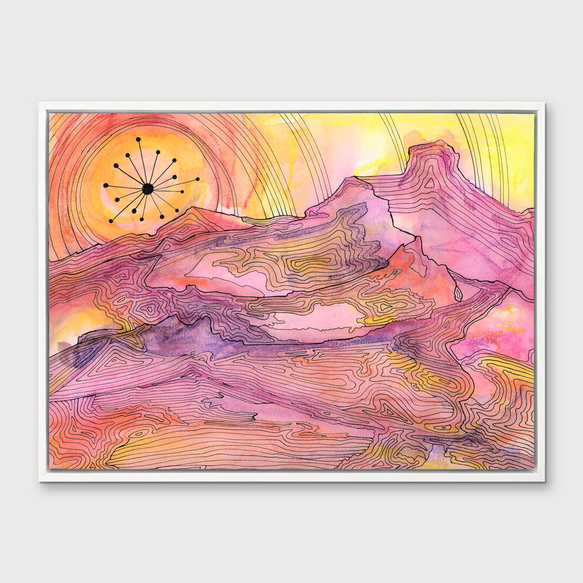 A pink, yellow and orange abstract landscape print with black outlines in a white floater frame hangs on a white wall.