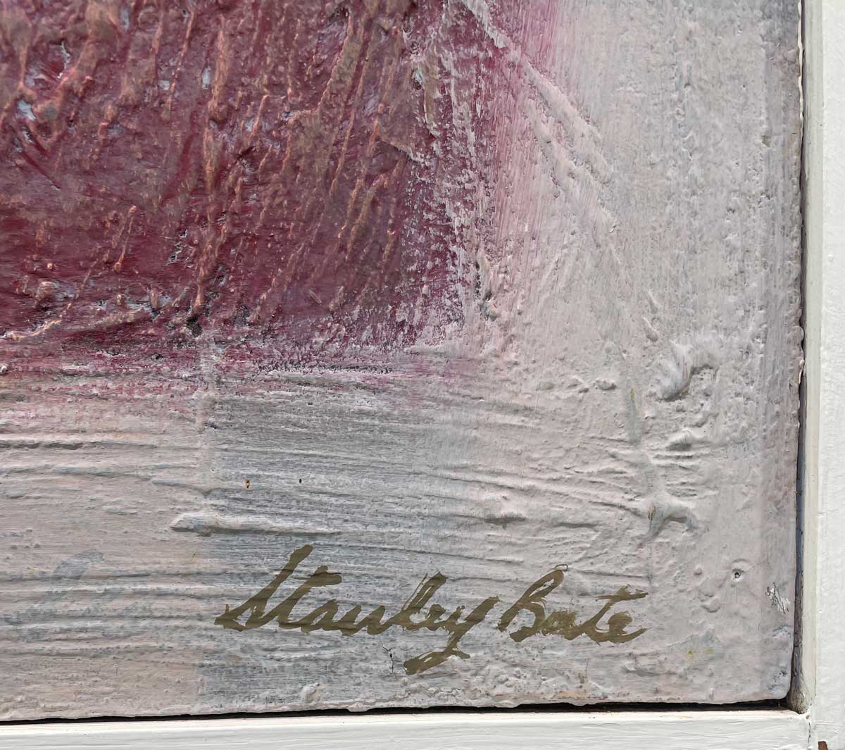 A close up of the artist's signature written in the lower right hand corner.