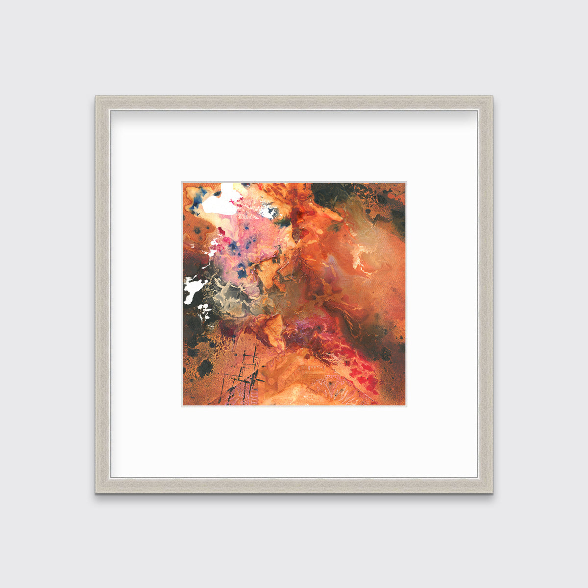 A red, orange, black and pink abstract print in a silver frame with a mat hangs on a white wall.