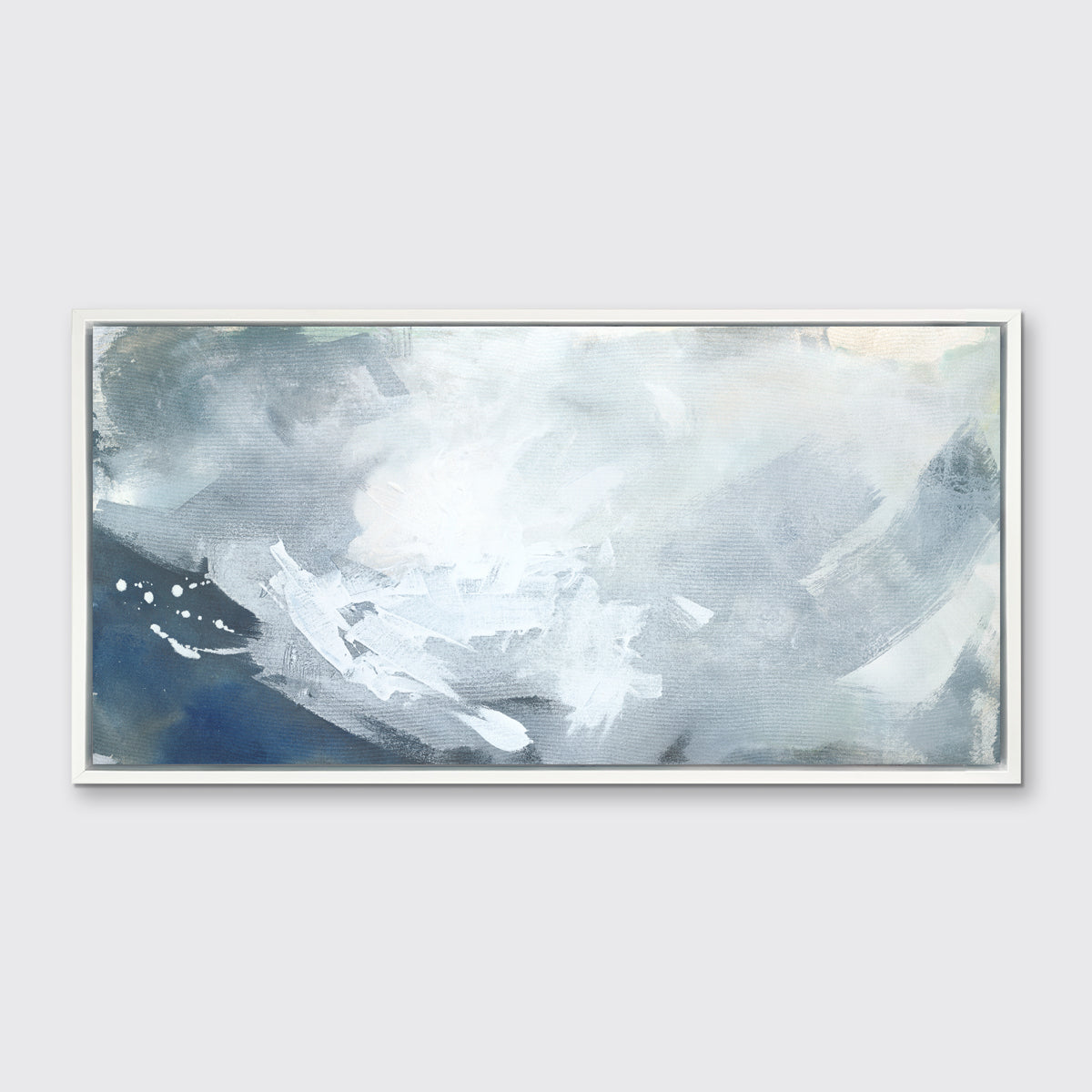 A blue, grey and white abstract print in a white floater frame hangs on a white wall.