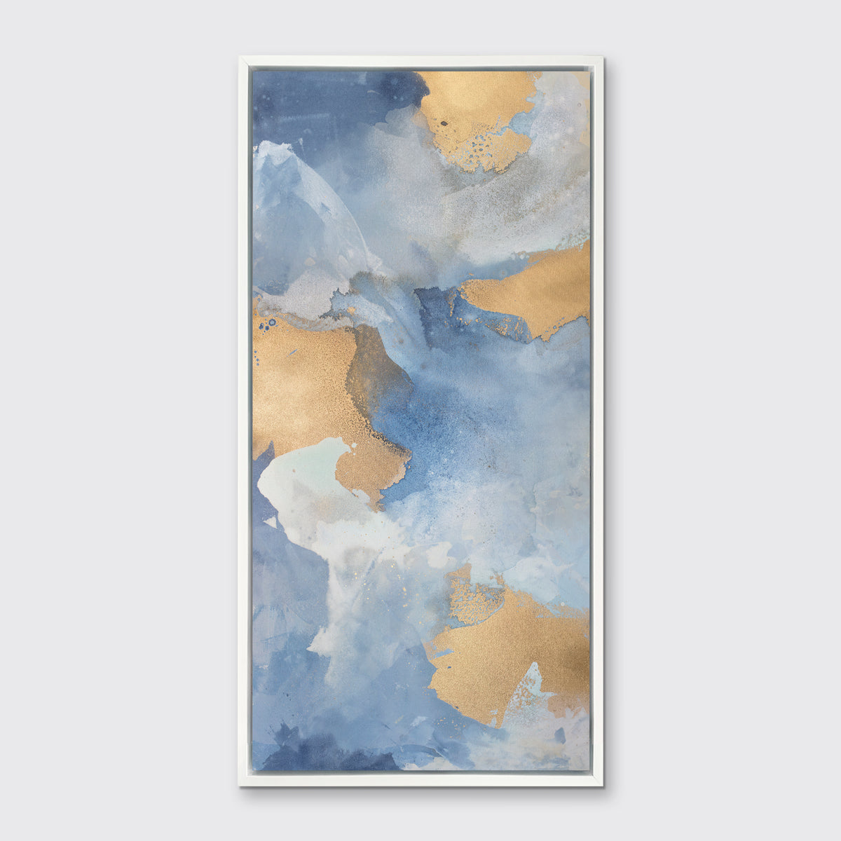A blue, gold and white abstract print in a white floater frame hangs on a white wall.