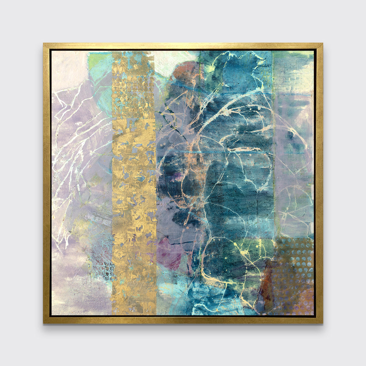 A blue, purple and gold abstract print in a gold floater frame hangs on a white wall.