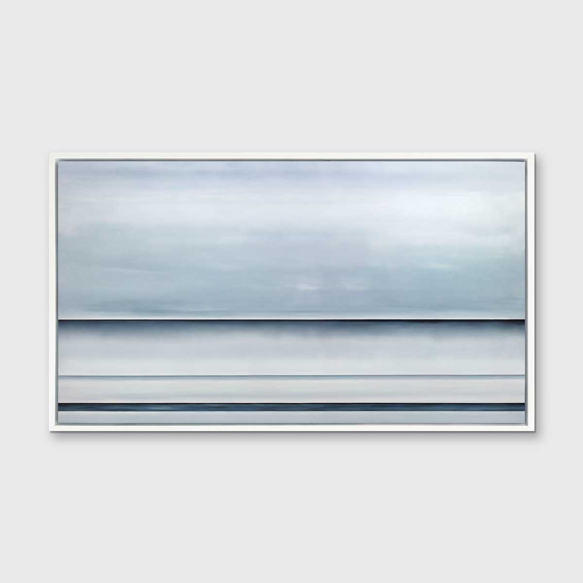 A tonal blue abstract landscape print in a white floater frame hangs on a white wall.