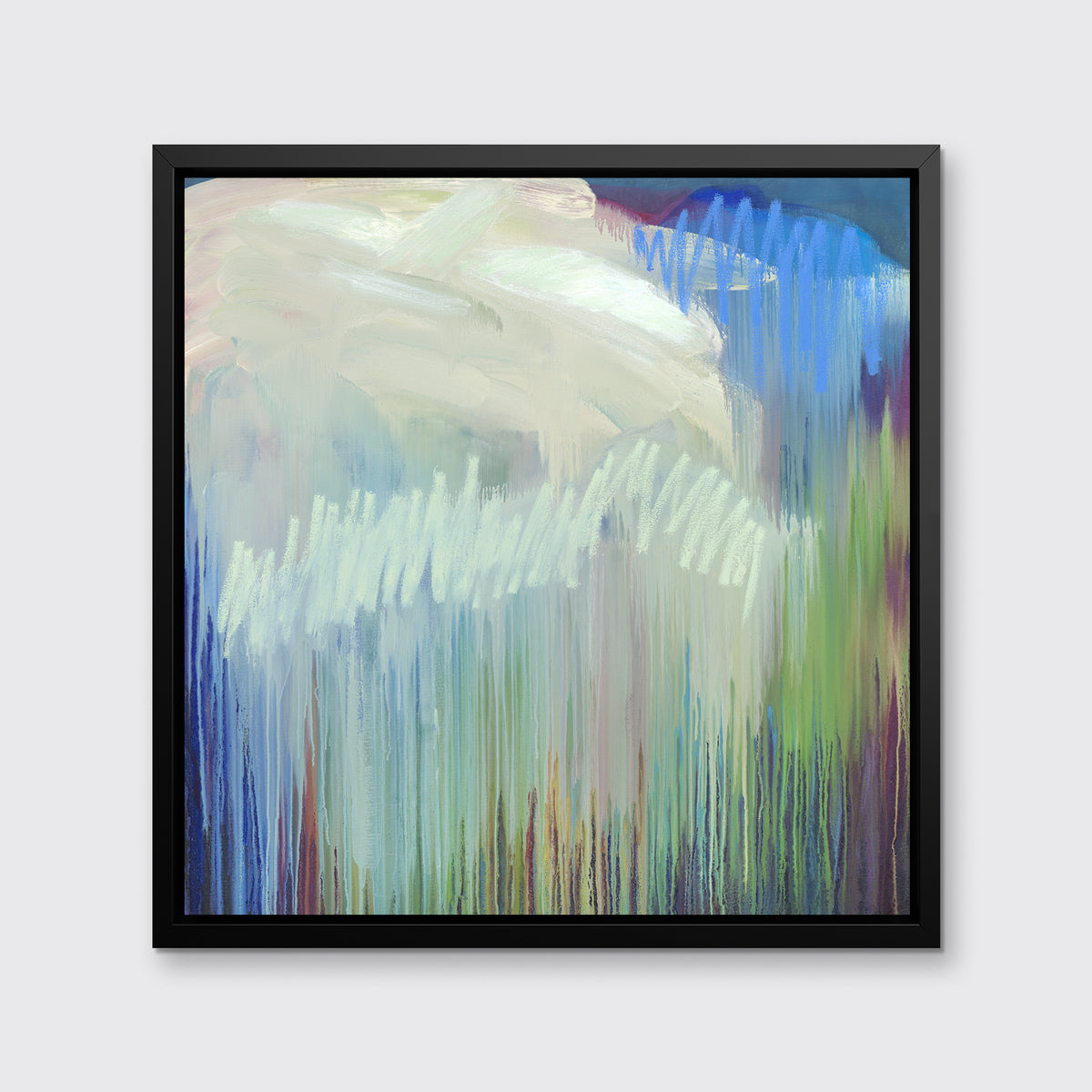 A multicolored abstract print in a black floater frame hangs on a white wall.