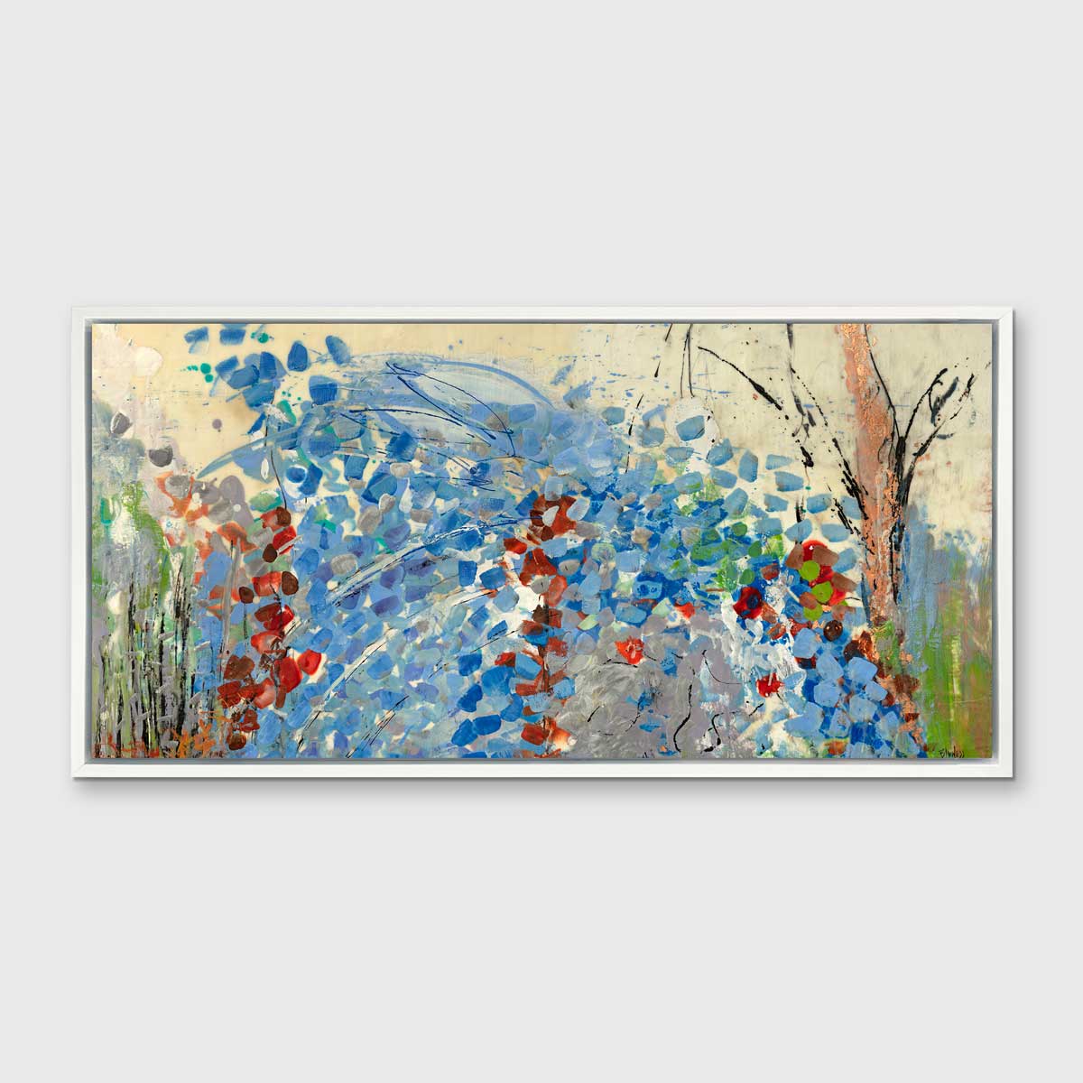 A blue, beige, green and black abstract print in a white floater frame hangs on a white wall.