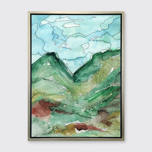 A blue, green and black abstract landscape print in a silver floater frame hangs on a white wall.