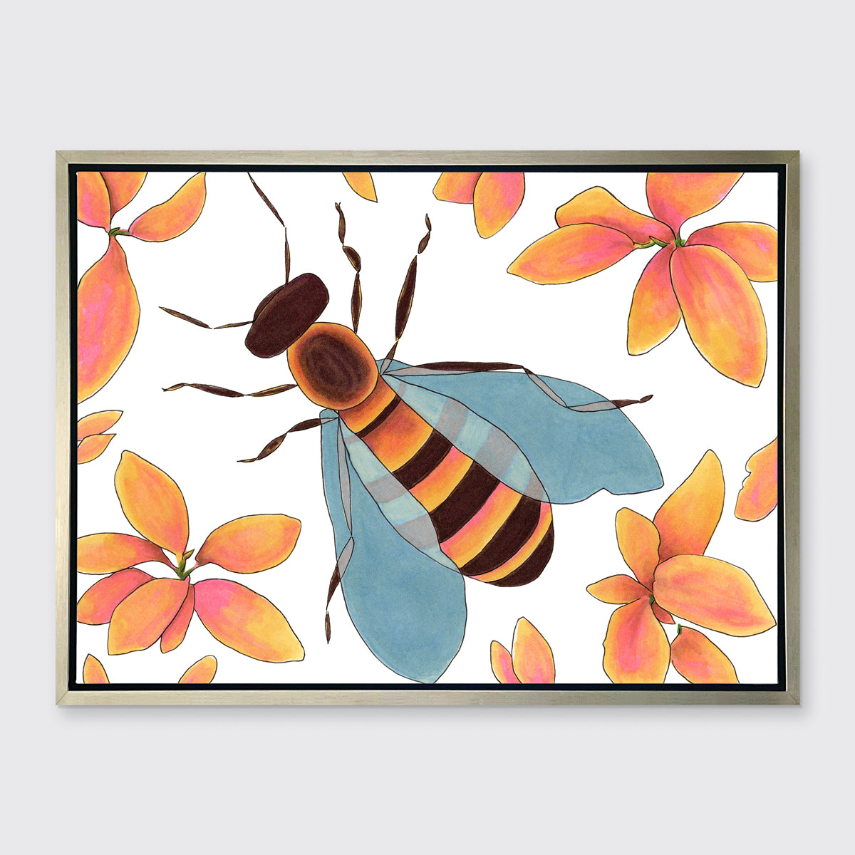 A bee surrounded by orange and pink flowers in a silver floater frame hangs on a white wall.