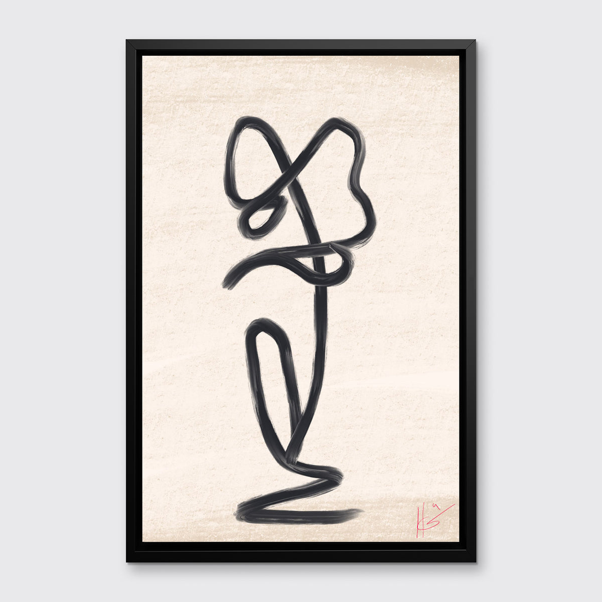 A black abstract minimalistic print hangs in a black floater frame on a light grey wall.