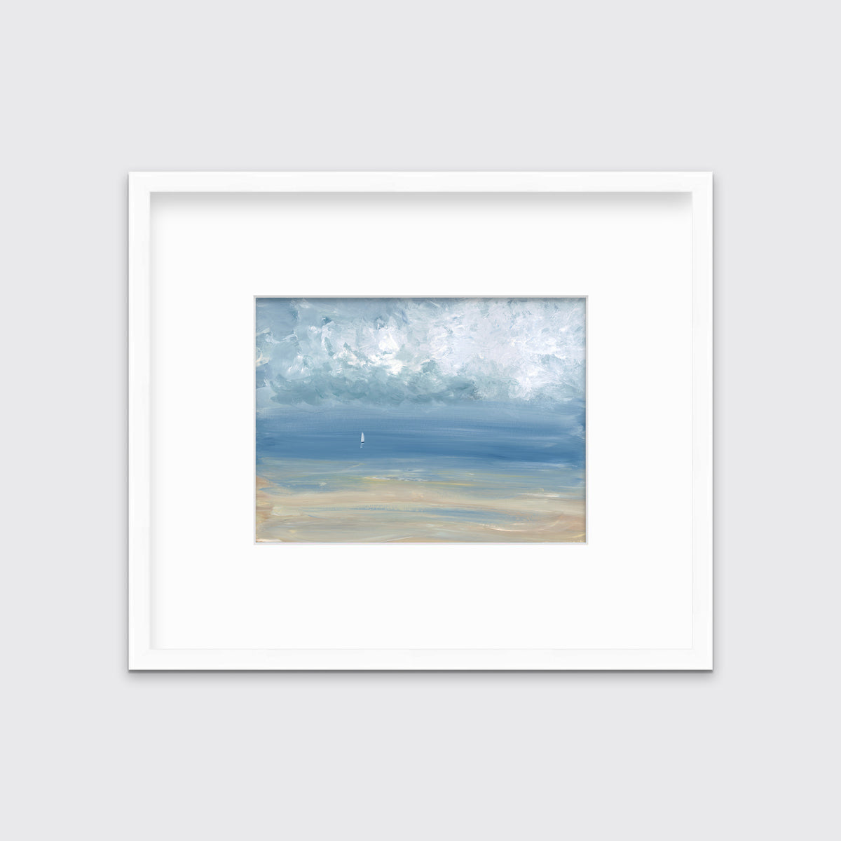 A white, blue and beige abstract seascape print in a white frame with a mat hangs on a white wall.