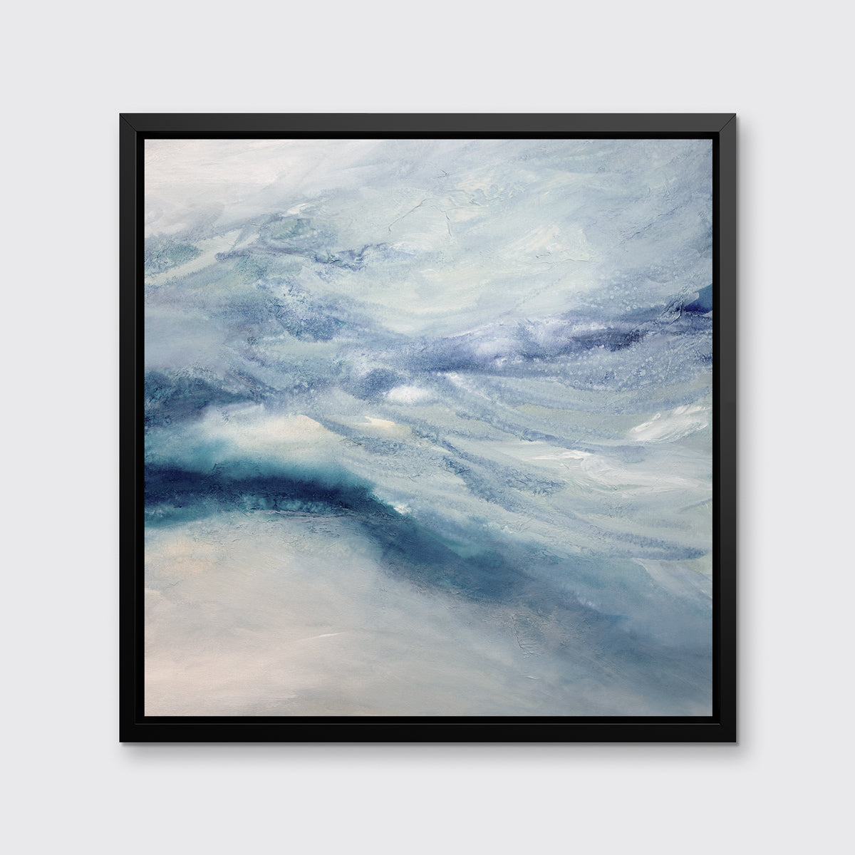 A blue, white, teal and light purple abstract print in a black floater frame hangs on a white wall.