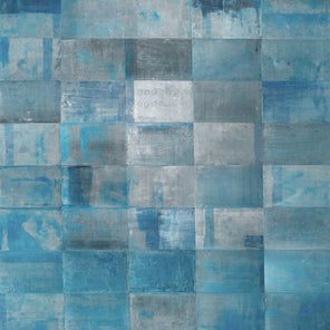 An abstract painting with a grid appearance from aluminum sheets pressed on board with a blue wash on top.