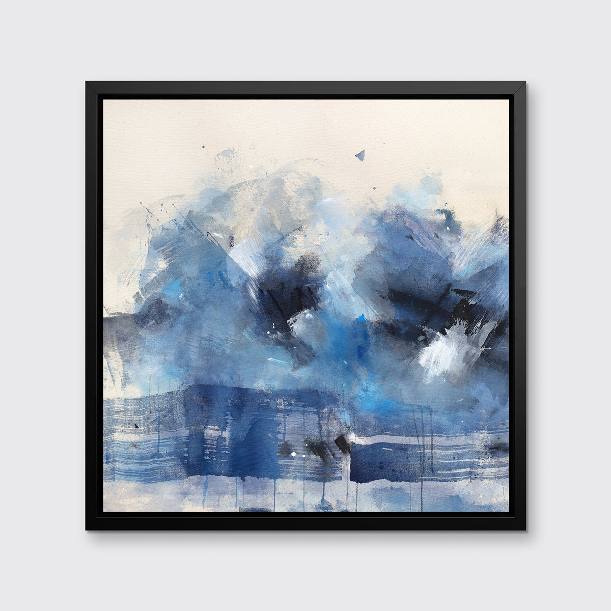 A blue, beige, white and black abstract print in a black floater frame hangs on a white wall.