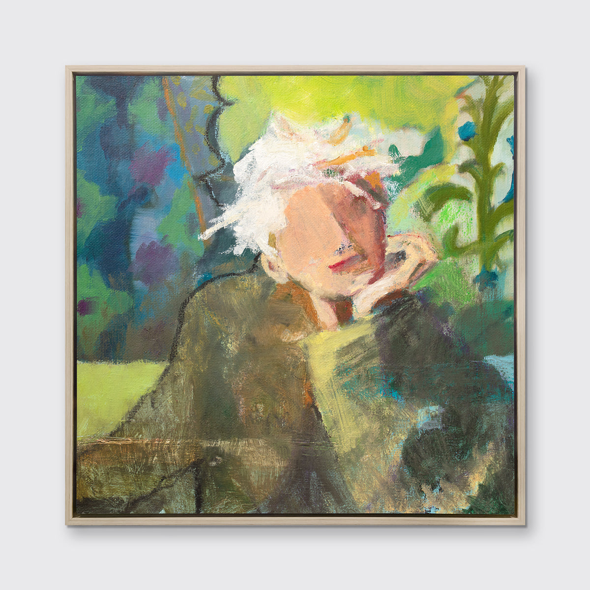 A green, beige and white abstract figural print in a white oak wood floater frame hangs on a white wall.
