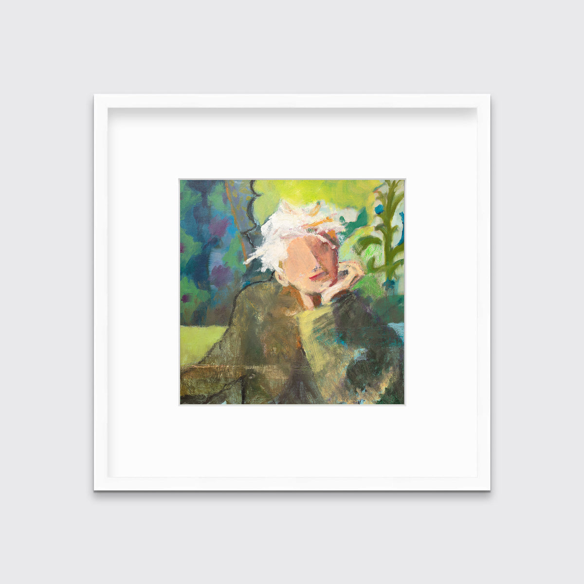 A green, beige and white abstract figural print in a white frame with a mat hangs on a white wall.