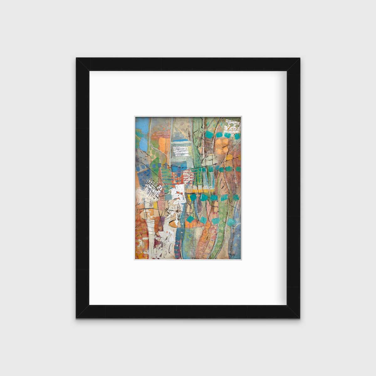An abstract multicolored print in a black frame with a mat hangs on a white wall.