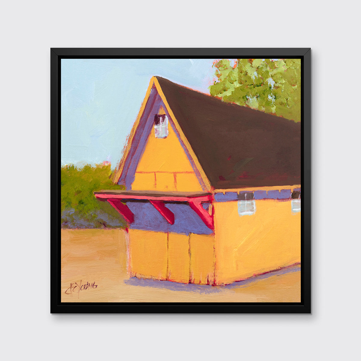 A yellow, orange, lavender and blue contemporary barn print in a black floater frame hangs on a white wall.