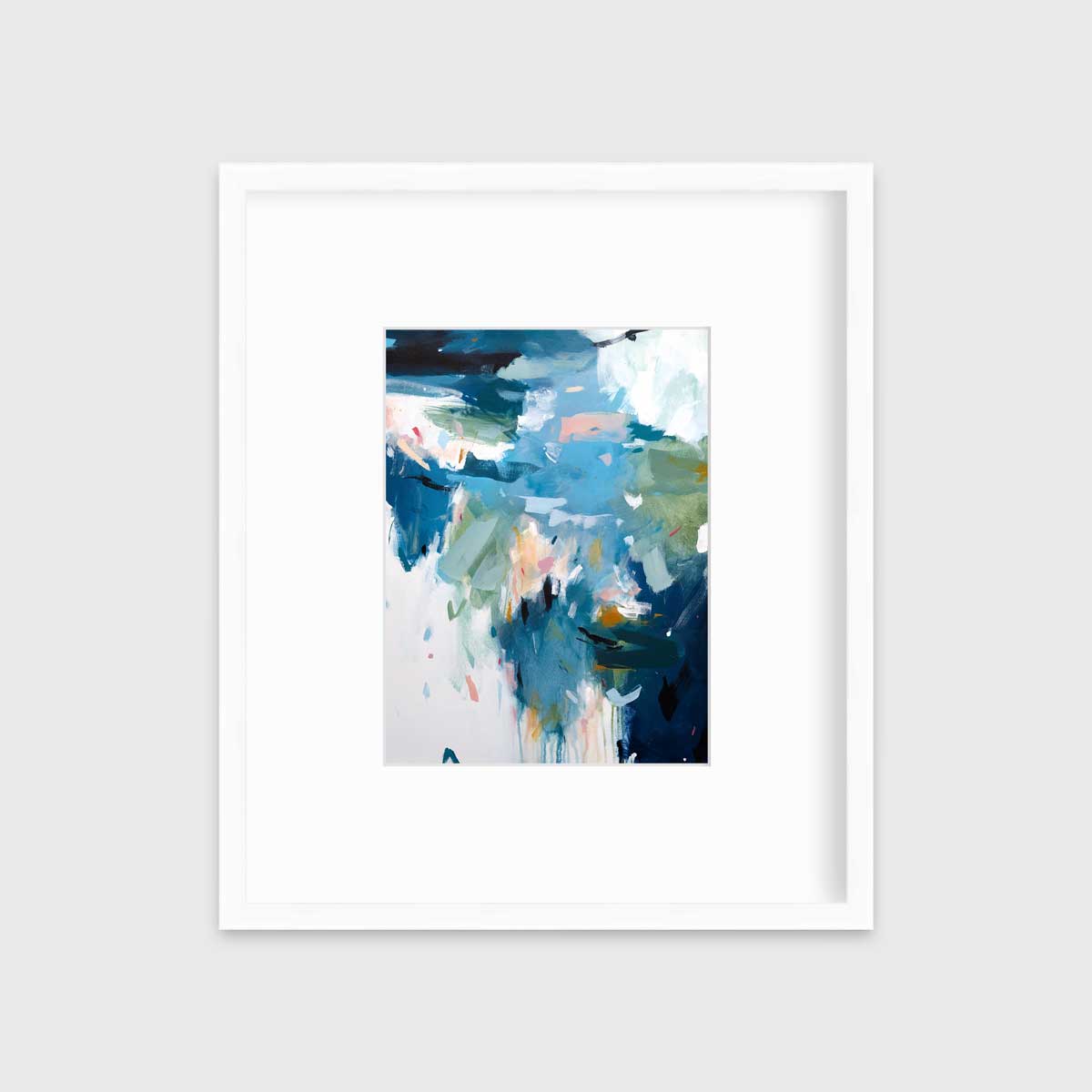 A blue abstract print by Kelly Rossetti in a white frame with a mat hangs on a white wall.