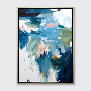 A blue abstract print in a silver floater frame hangs on a white wall.