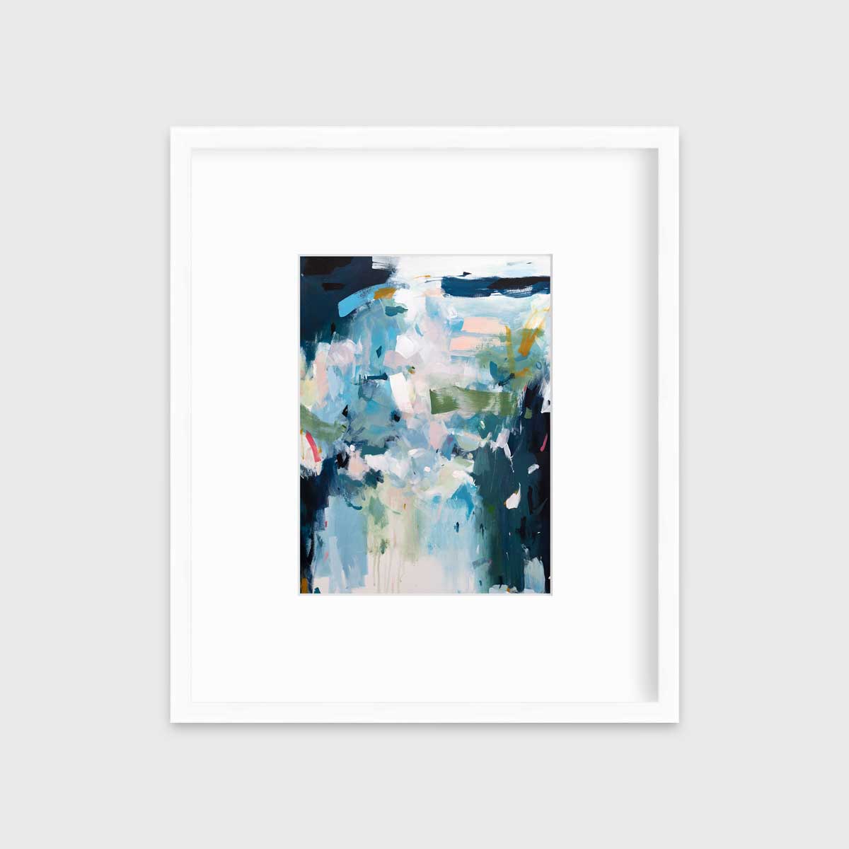 A blue abstract print by Kelly Rossetti in a white frame with a mat hangs on a white wall.