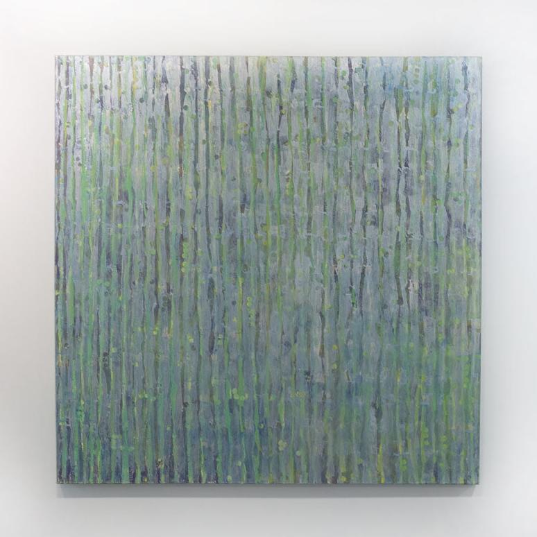 A painting with purple and green undertones and striated with silver lines hangs on a gallery wall.