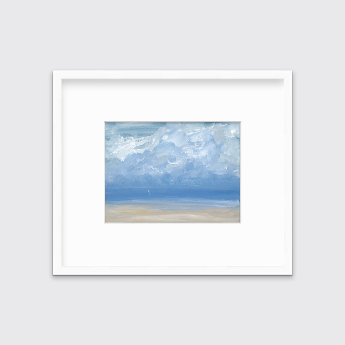 A white, blue and beige abstract seascape print in a white frame with a mat hangs on a white wall.