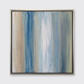 A blue, white, orange and grey abstract print in a silver floater frame hangs on a white wall.