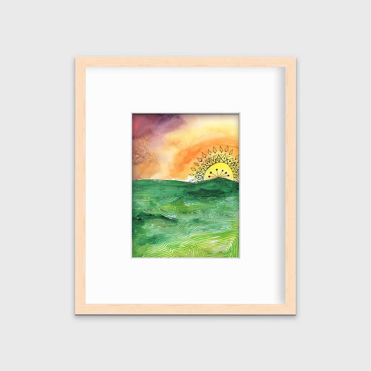 A multicolored abstract landscape print in a natural wood frame with a mat hangs on a white wall.