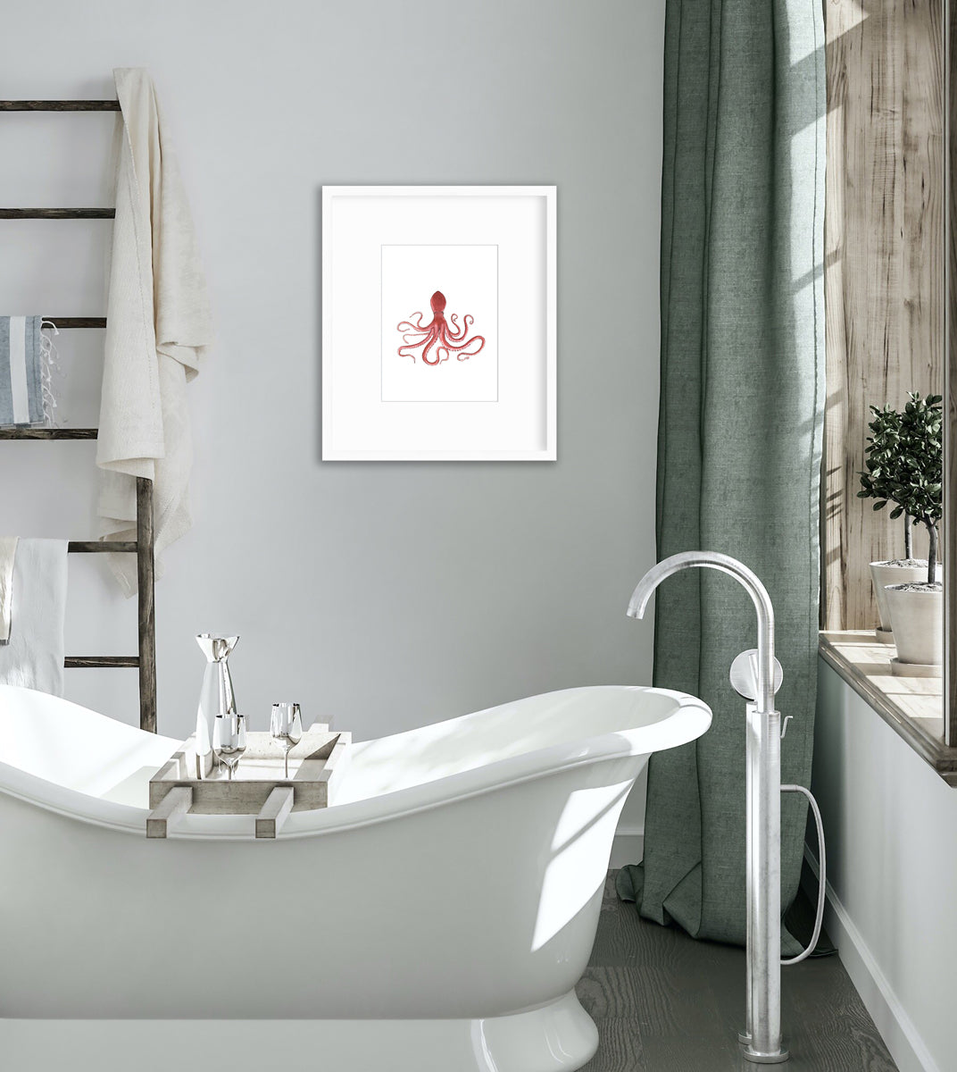 A pink octopus print in a white frame with a mat hangs on a white wall above a white soaking bathtub and next to a ladder with towels and a large windowsill with potted plants.