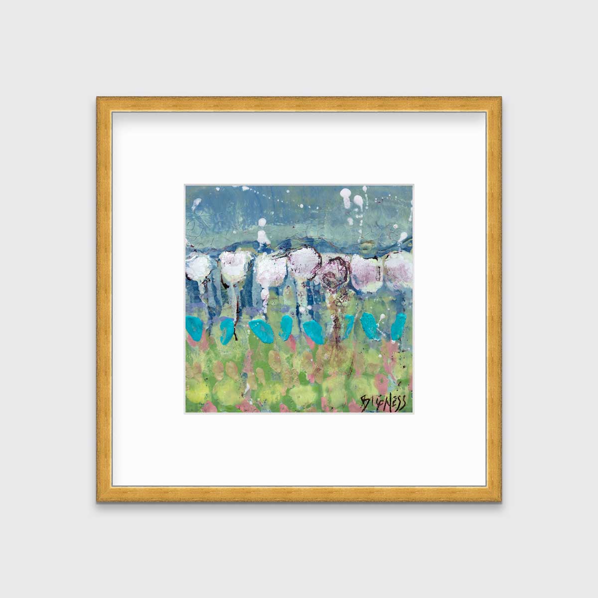 A teal, green and white abstract floral print in a gold frame with a mat hangs on a white wall.
