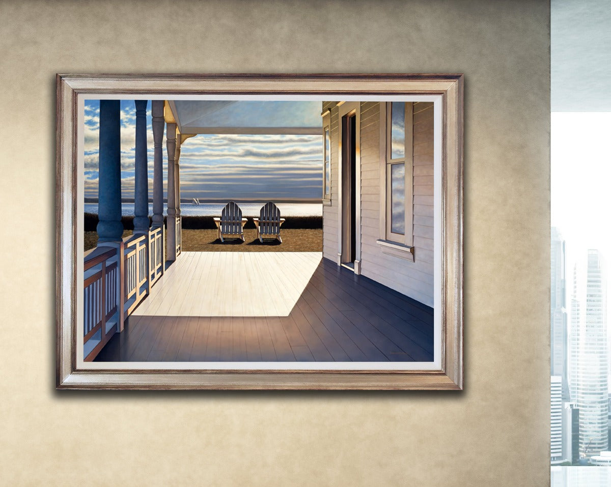 "Passing Time" Framed and staged on a beige wall. To the right side is a glimpse of a window looking out to a city skyline.