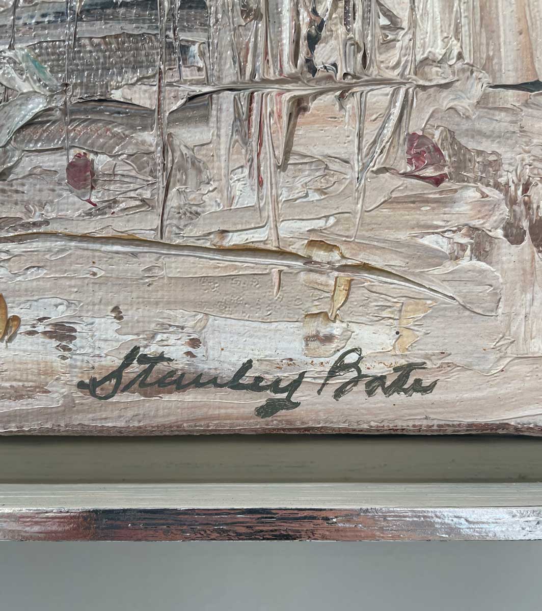 A close up of the artist's signature in the bottom right hand corner.