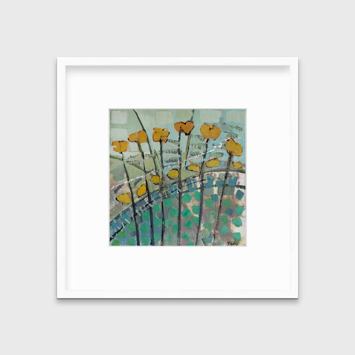 A blue, yellow, and green abstract floral print in a white frame with a mat hangs on a white wall.