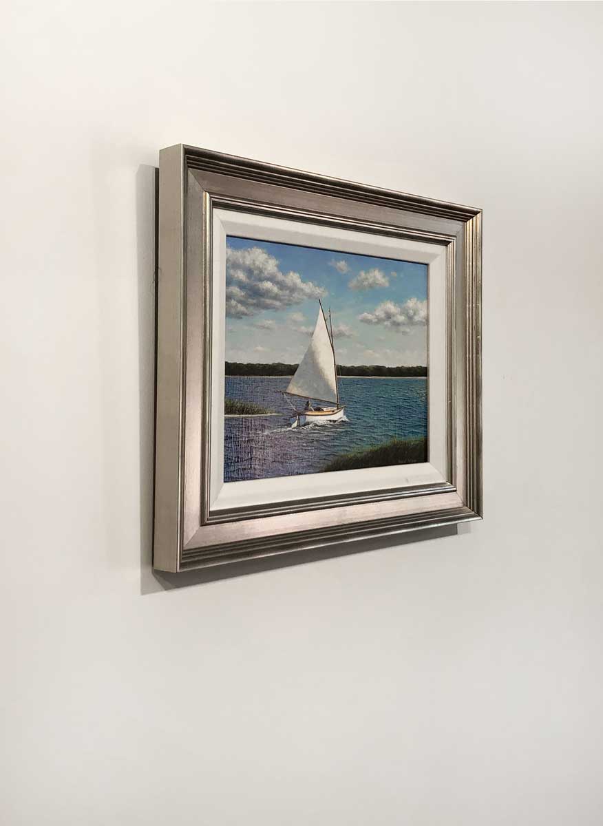 A right side-angle of a painting of a sail boat.