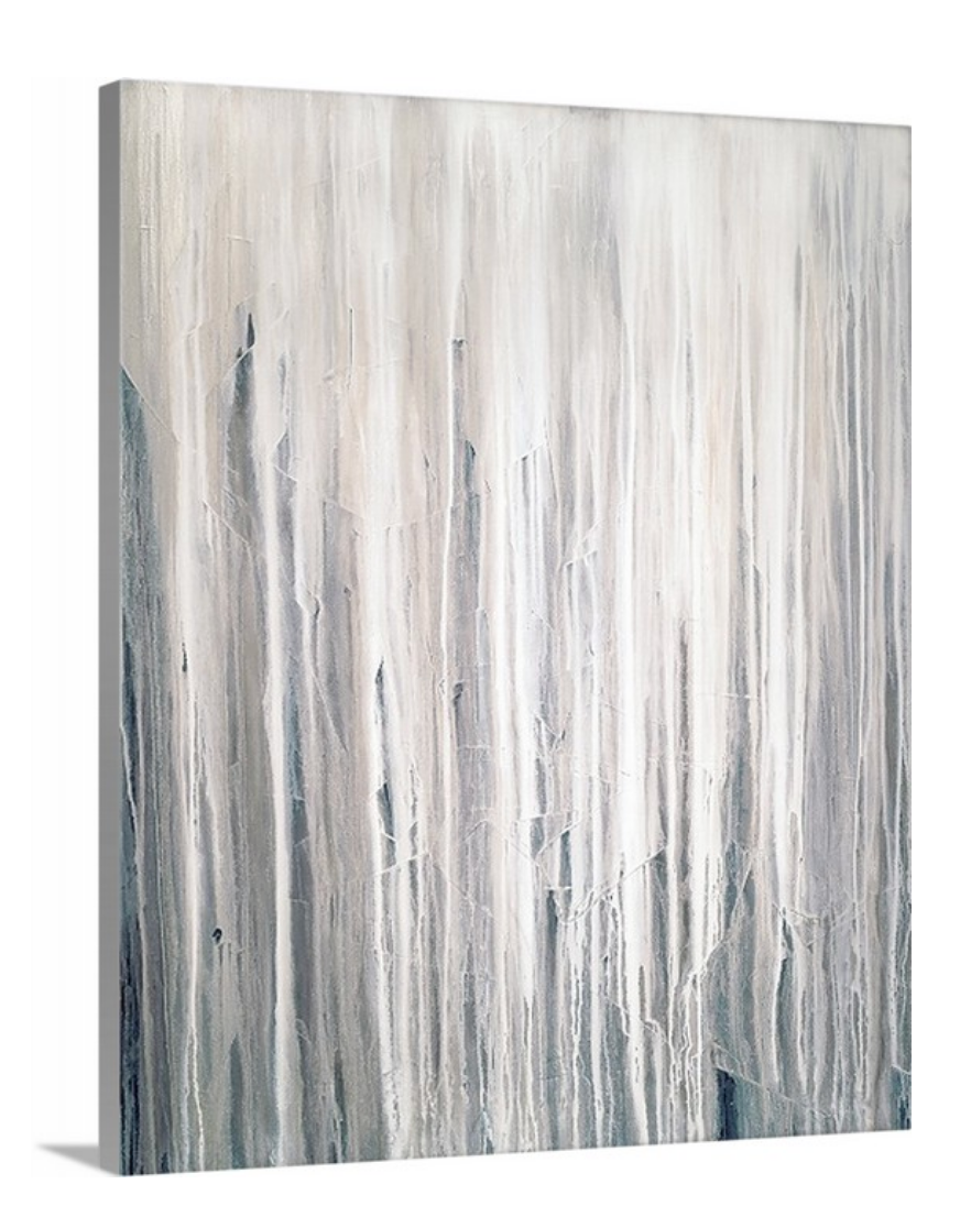 A side-angle view of a white, cream and charcoal print on canvas.