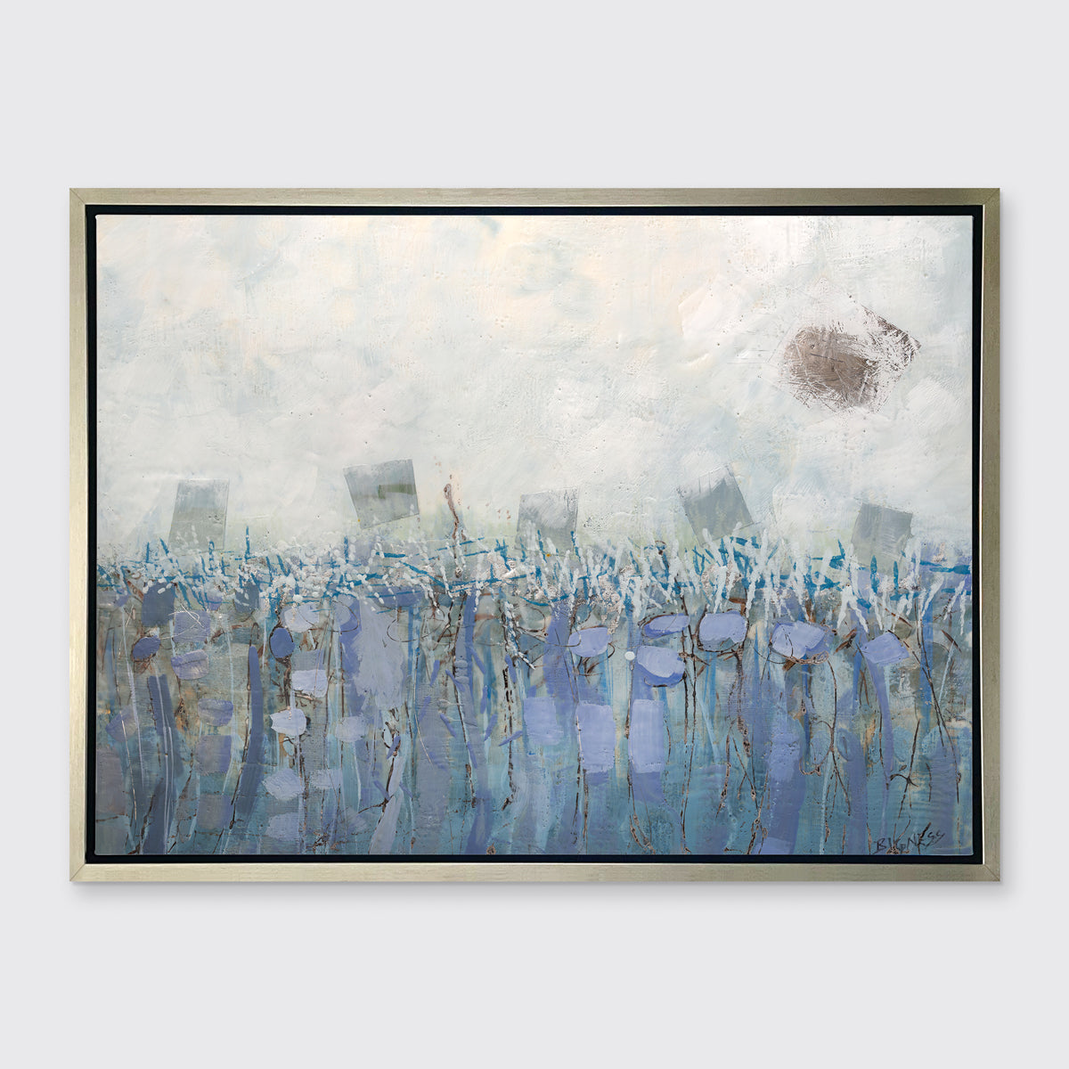 A beige, teal and lavender abstract print in a silver floater frame hangs on a white wall.