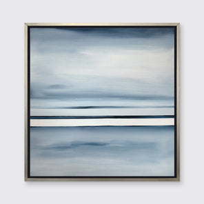 A blue and white linear abstract landscape print in a silver floater frame on a wall.