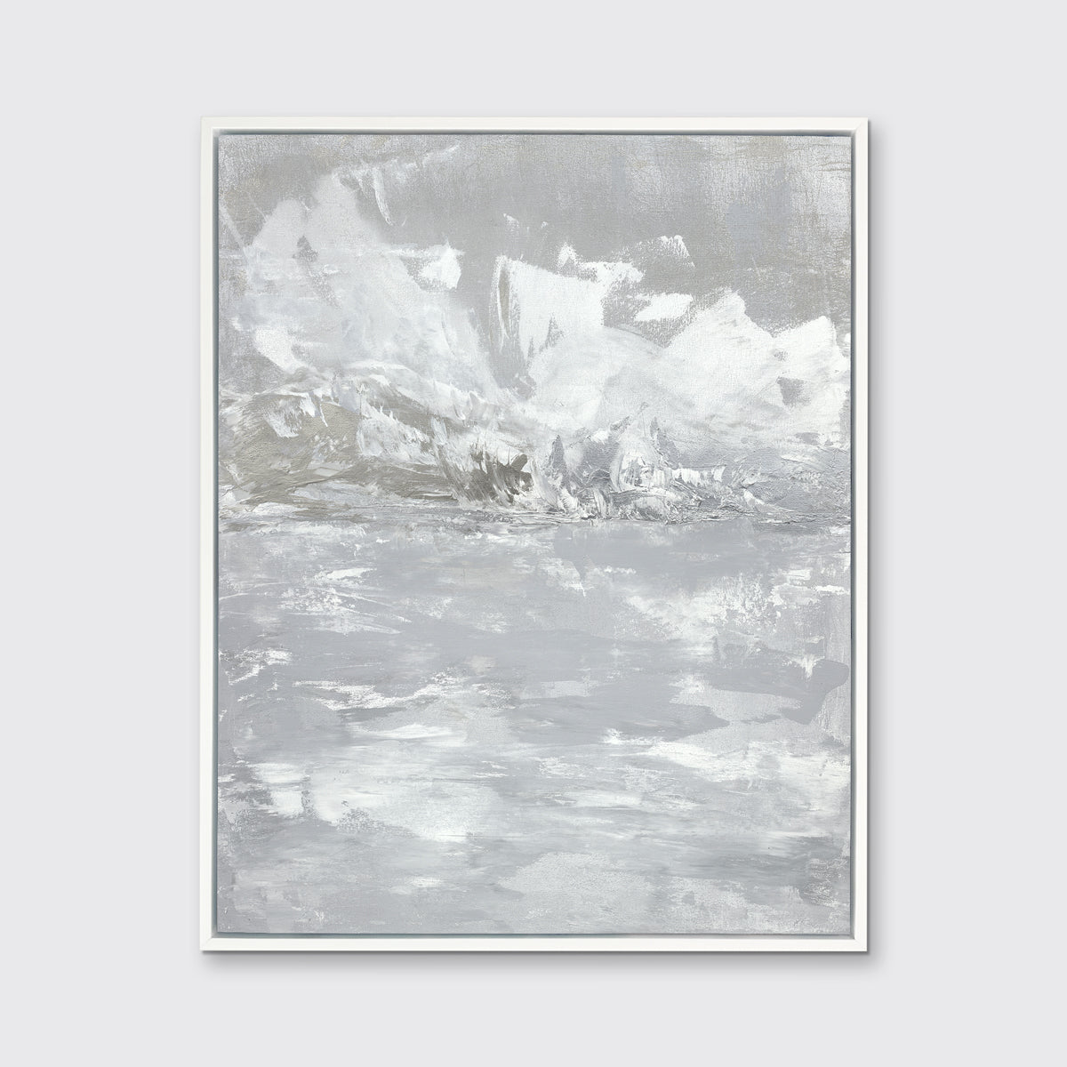 A white and grey abstract print in a white floater frame hangs on a white wall.