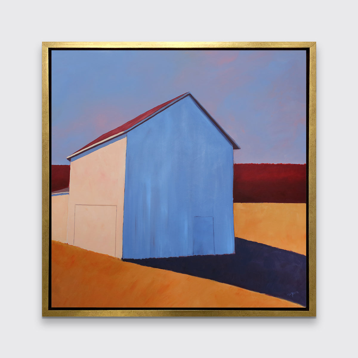 A lavender, red, beige and orange contemporary barn print in a gold floater frame hangs on a white wall.