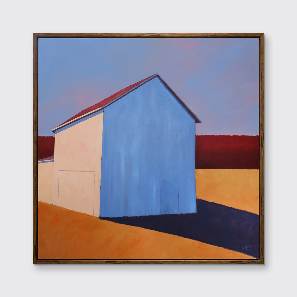 A lavender, red, beige and orange contemporary barn print in an oak wood floater frame hangs on a white wall.