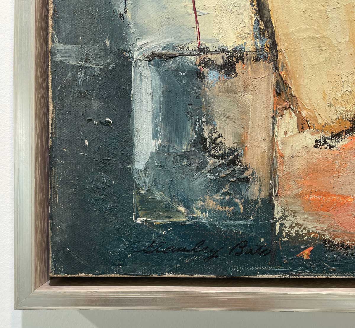 A close up of the textured painting reveals the signature of the artist, Stanley Bate.