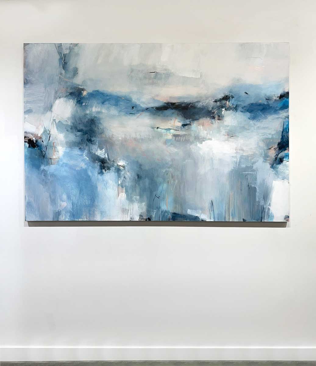 Cool toned abstract painting with spots of beige by Kelly Rossetti hangs on a white wall in the gallery.