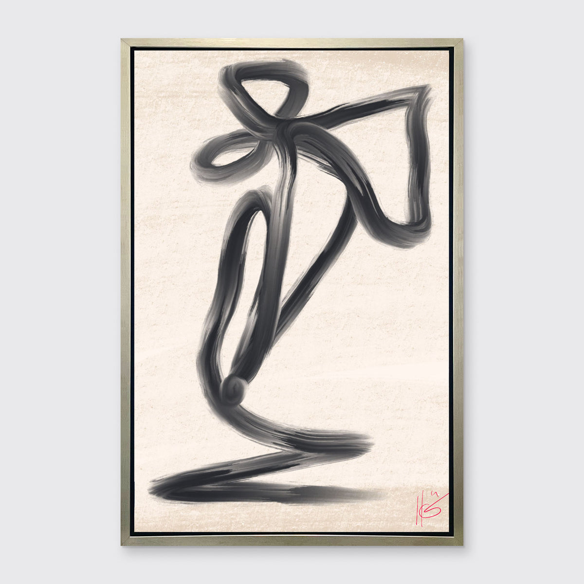 A black and beige abstract print framed in a warm silver floater frame hangs on a light grey wall.