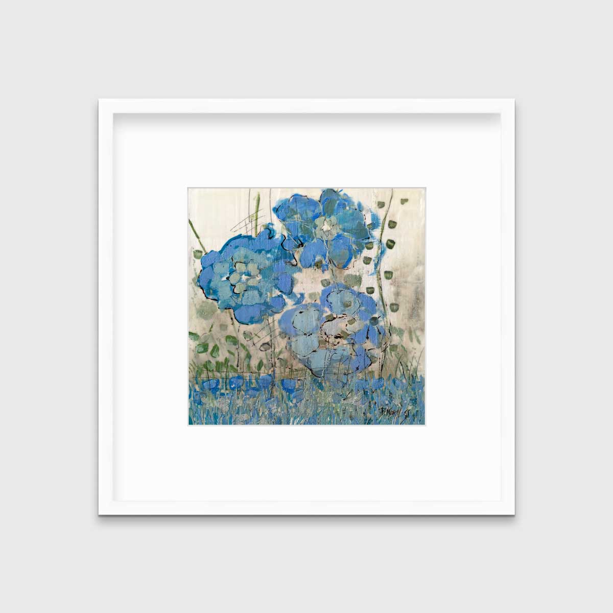 A blue floral print in a white frame with a mat hangs on a white wall.