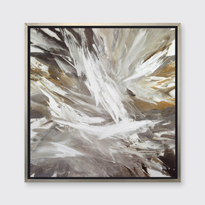 A white, grey, dark grey and gold abstract print in a silver floater frame hangs on a white wall.