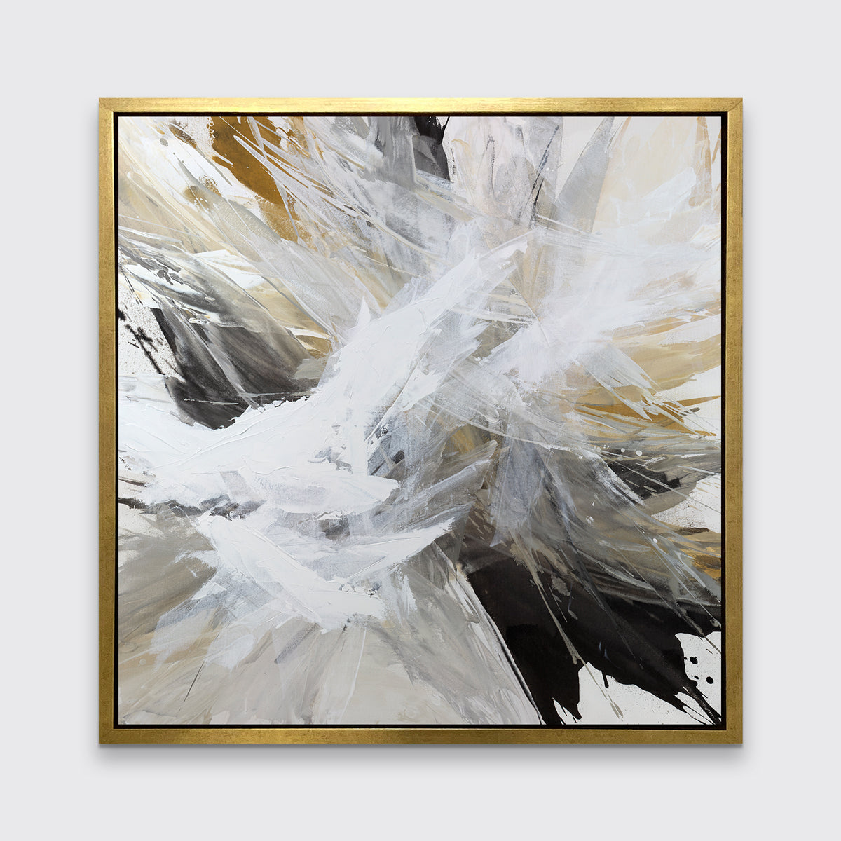 A white, black, grey and gold abstract print in a gold floater frame hangs on a white wall.