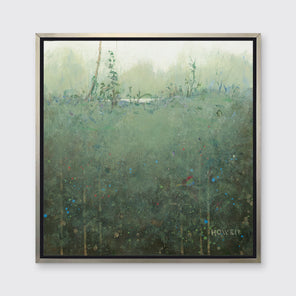 A dark muted green abstract landscape print in a silver floater frame hangs on a white wall.