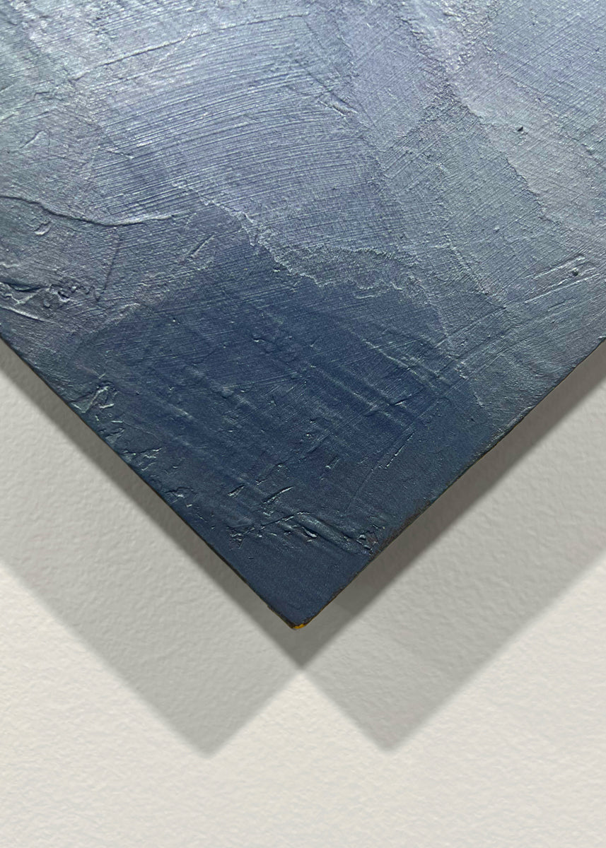 A close up detail image of one of the corners from Roger Mudre's painting.
